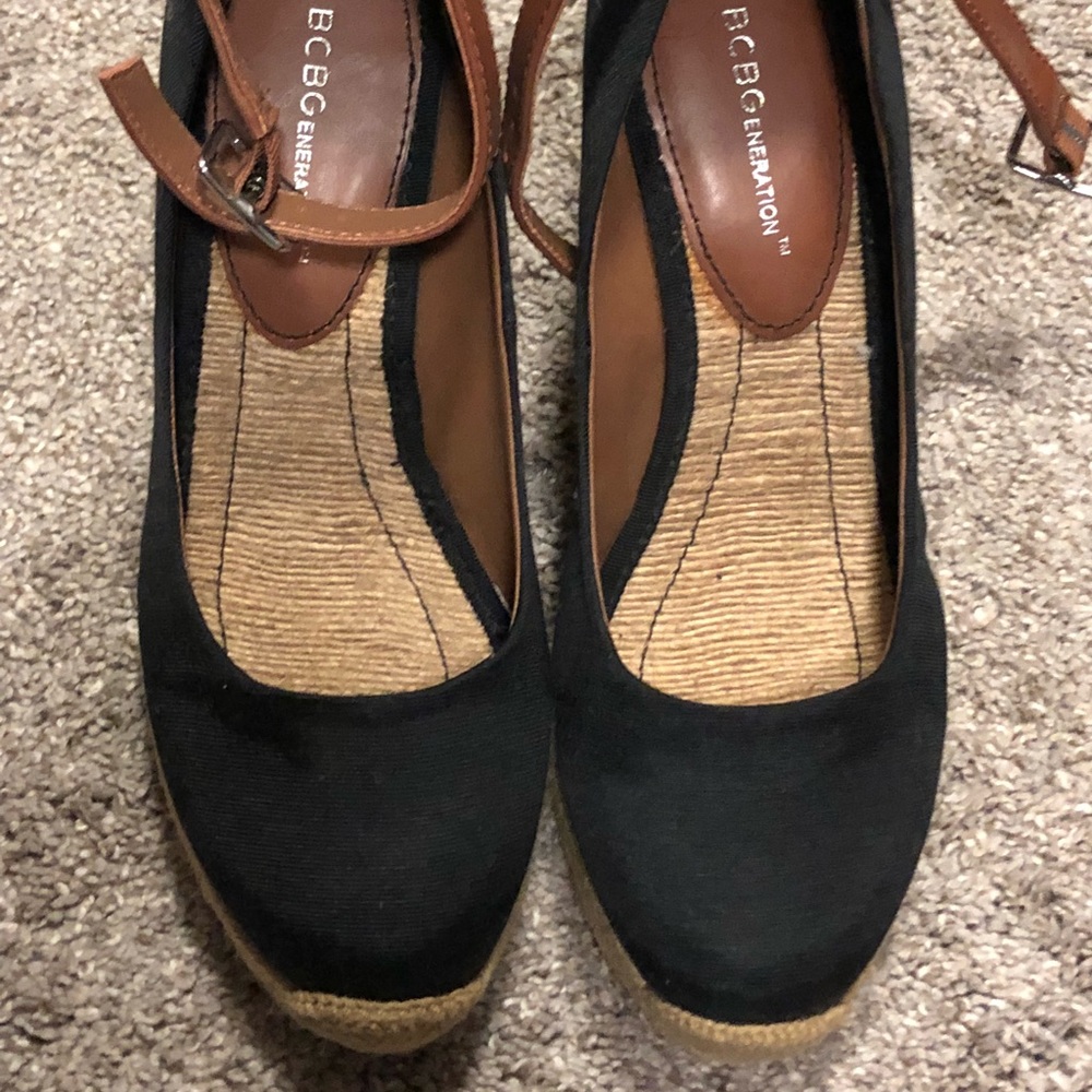 BCBG size 8.5 navy espadrilles with brown strap.